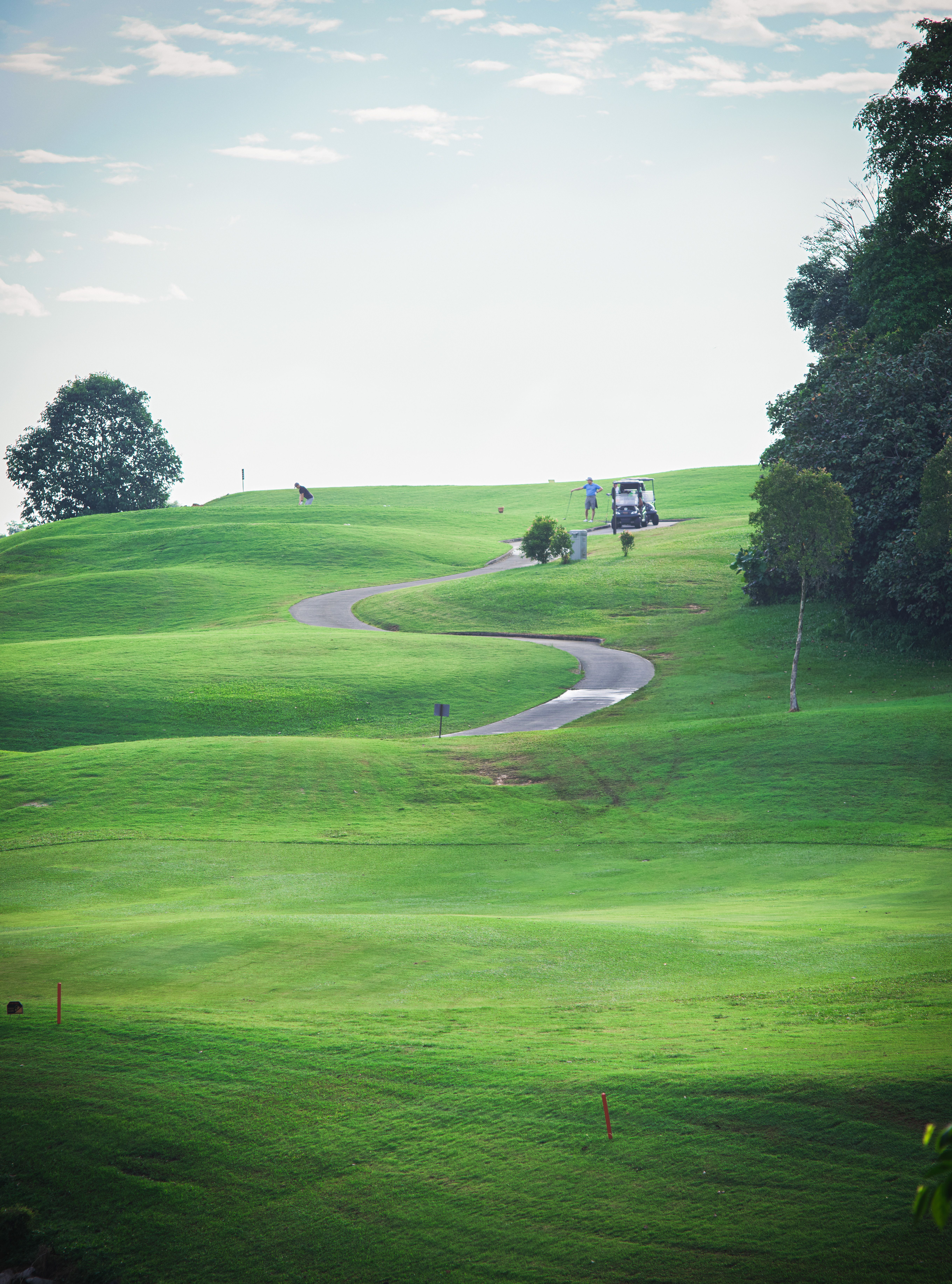 Wide fairway with rolling green landscape